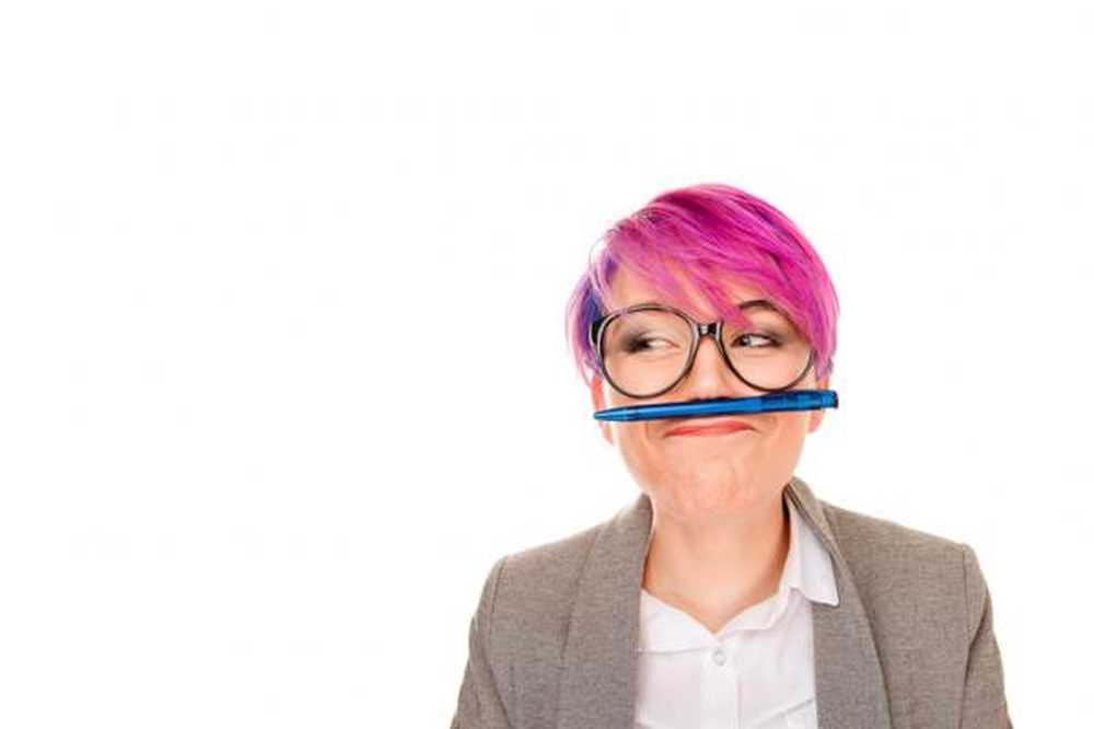 Синдром питера. The girl holding the Pen is wearing Glasses.